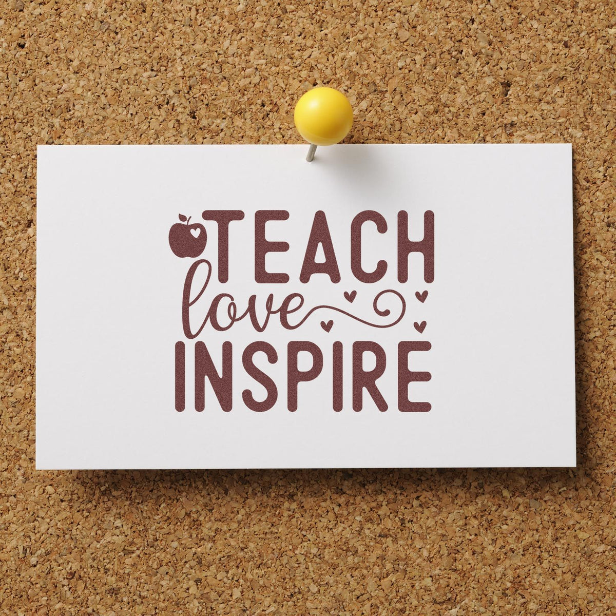 Teach Love Inspire teacher rubber stamp on a white card, pinned to corkboard for classroom crafts and gifts.