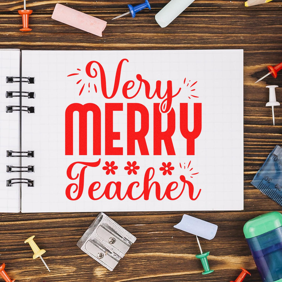 Very Merry Teacher Lettering rubber stamp shown in red ink, stamped for projects such as advent gift tags.