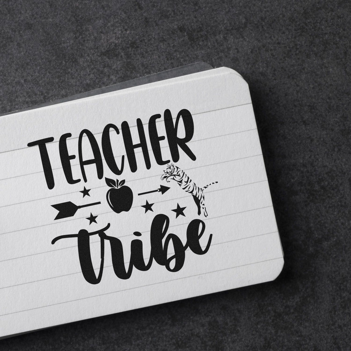 Teacher Tribe rubber stamp design with apple, stars and tiger icon for classroom teacher gifts and school crafting.