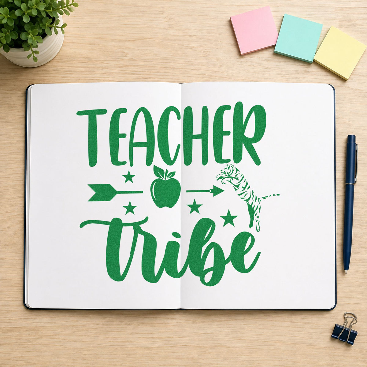 Teacher Tribe Arrow Apple craft stamp imprint in green ink on a handmade project, one idea being framed cabin wall.