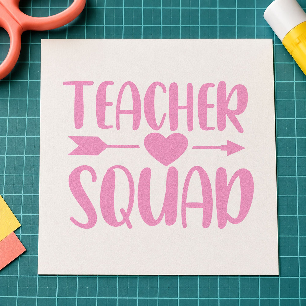 Teacher Squad Heart Arrow craft stamp in purple ink on cardstock, an easy option for link team tags.
