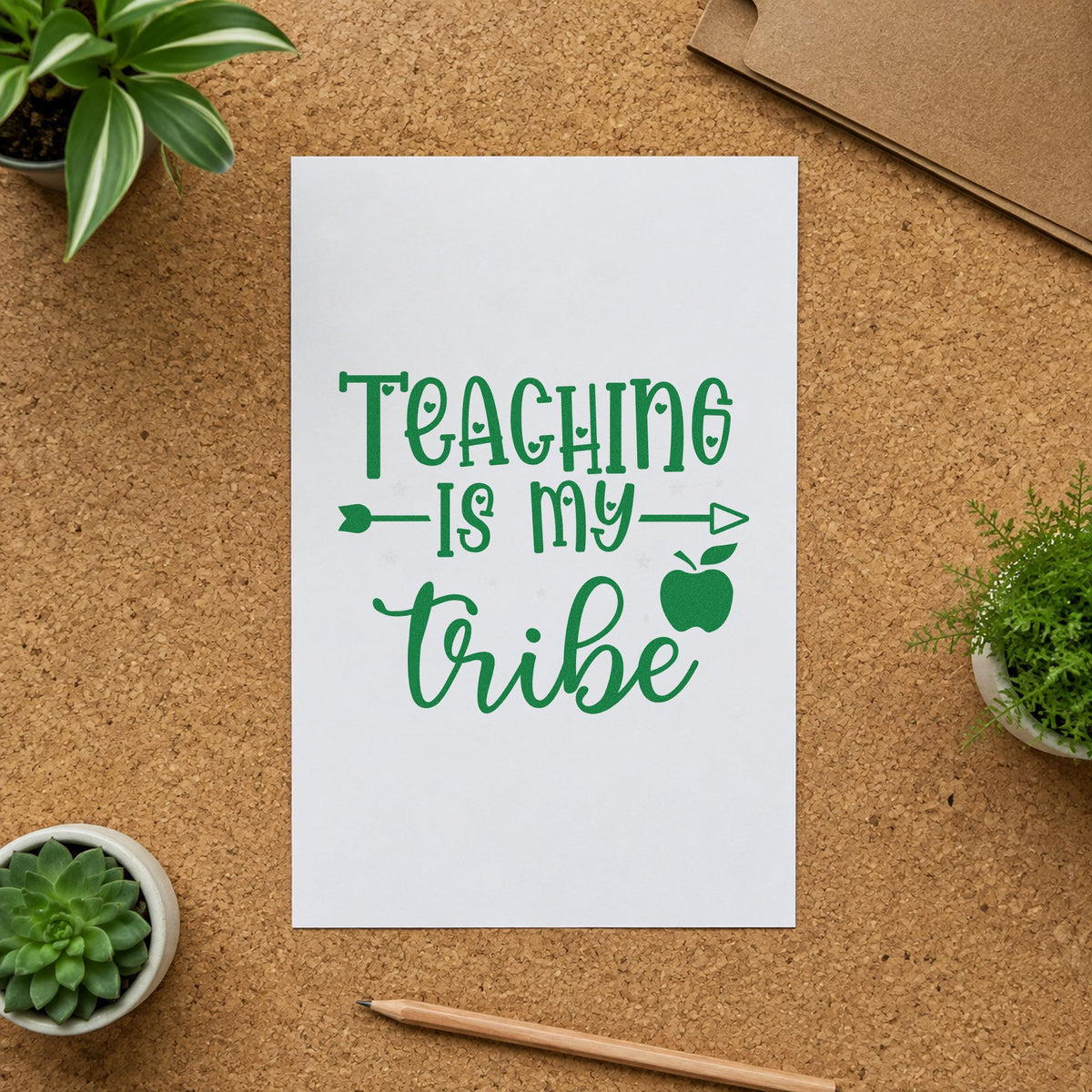 Teaching Is My Tribe craft stamp imprint in green ink on a handmade project, one idea being scheme cover pages.