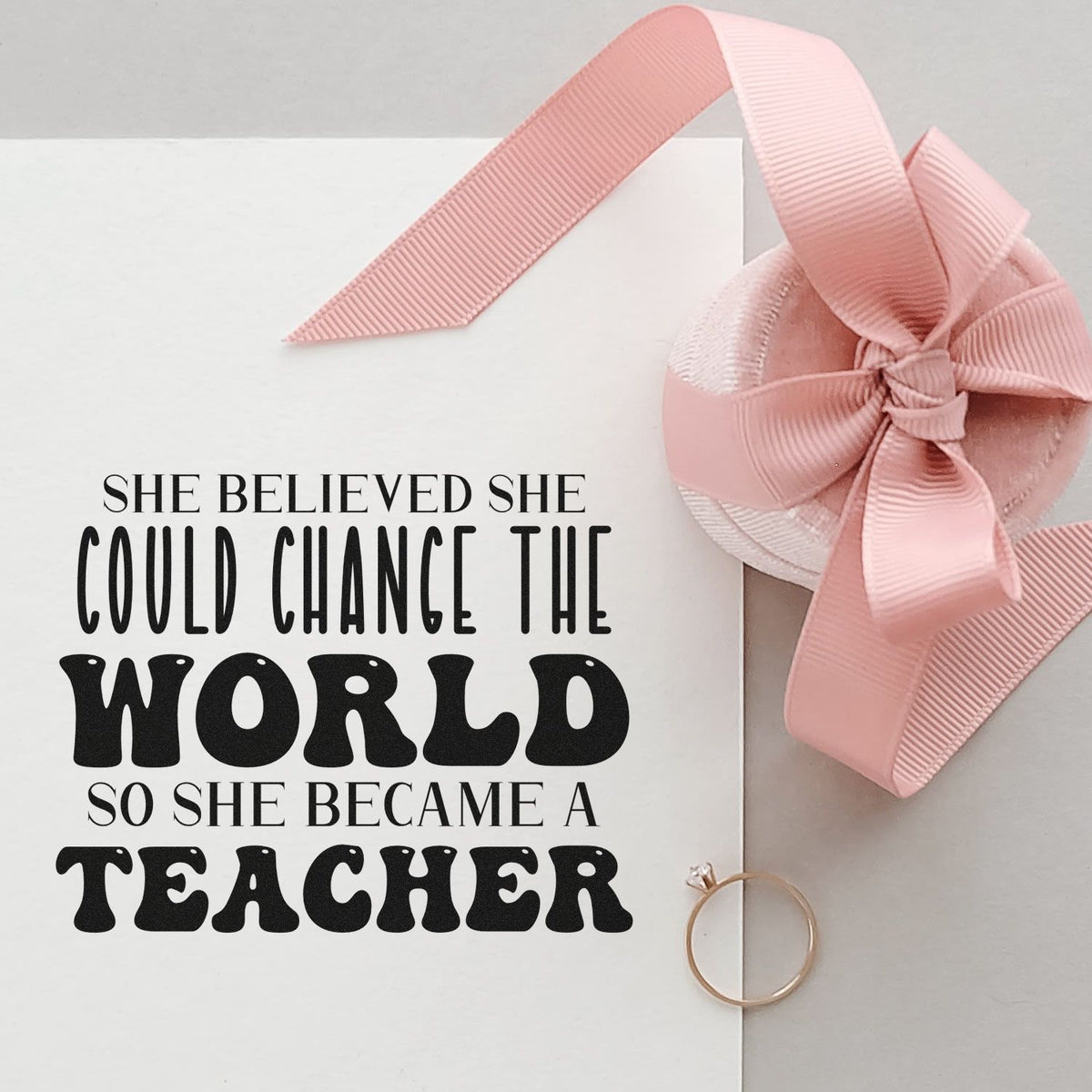 Teacher quote rubber stamp design for gift cards: She believed she could change the world, so she became a teacher.
