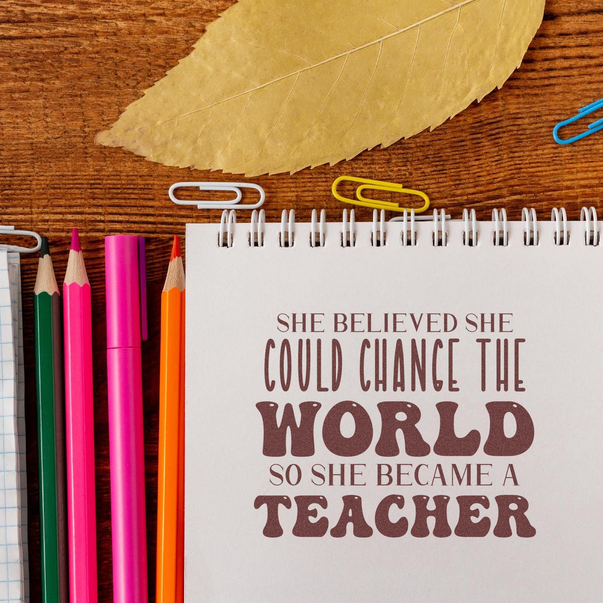 Teacher appreciation rubber stamp design with inspirational quote, She believed she could change the world so she became a teacher.