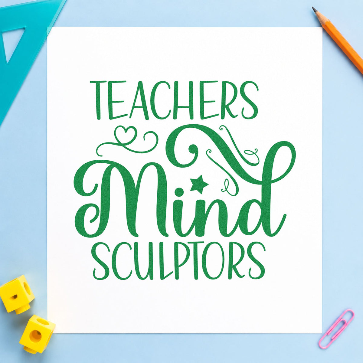 Teachers Mind Sculptors craft stamp imprint in green ink on a handmade project, one idea being kiln log pages.
