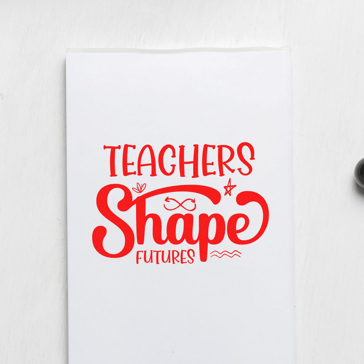 Red teacher rubber stamp design reading Teachers Shape Futures for classroom crafts, gifts, and teacher appreciation.