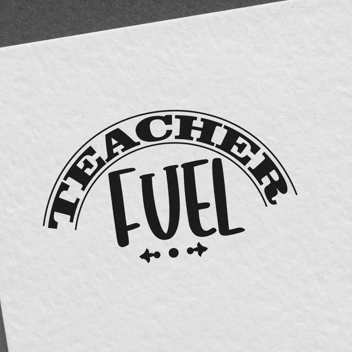 Teacher Fuel rubber stamp imprint on paper for classroom use, teacher appreciation gifts, and custom stationery.