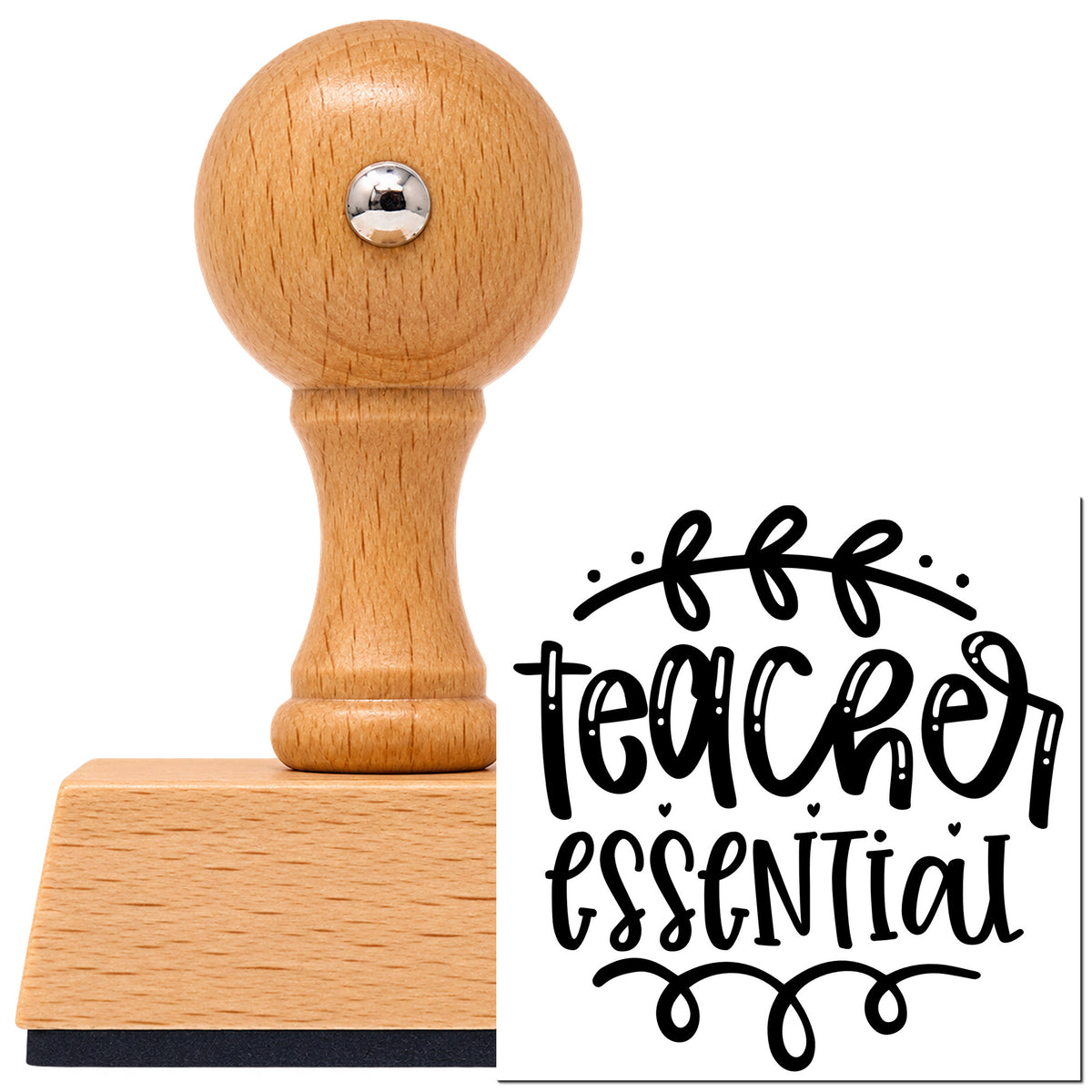 Teacher Essential Leafy Flourish Vintage Pro rubber stamp in European beech wood with a round knob handle, shown beside its black imprint.