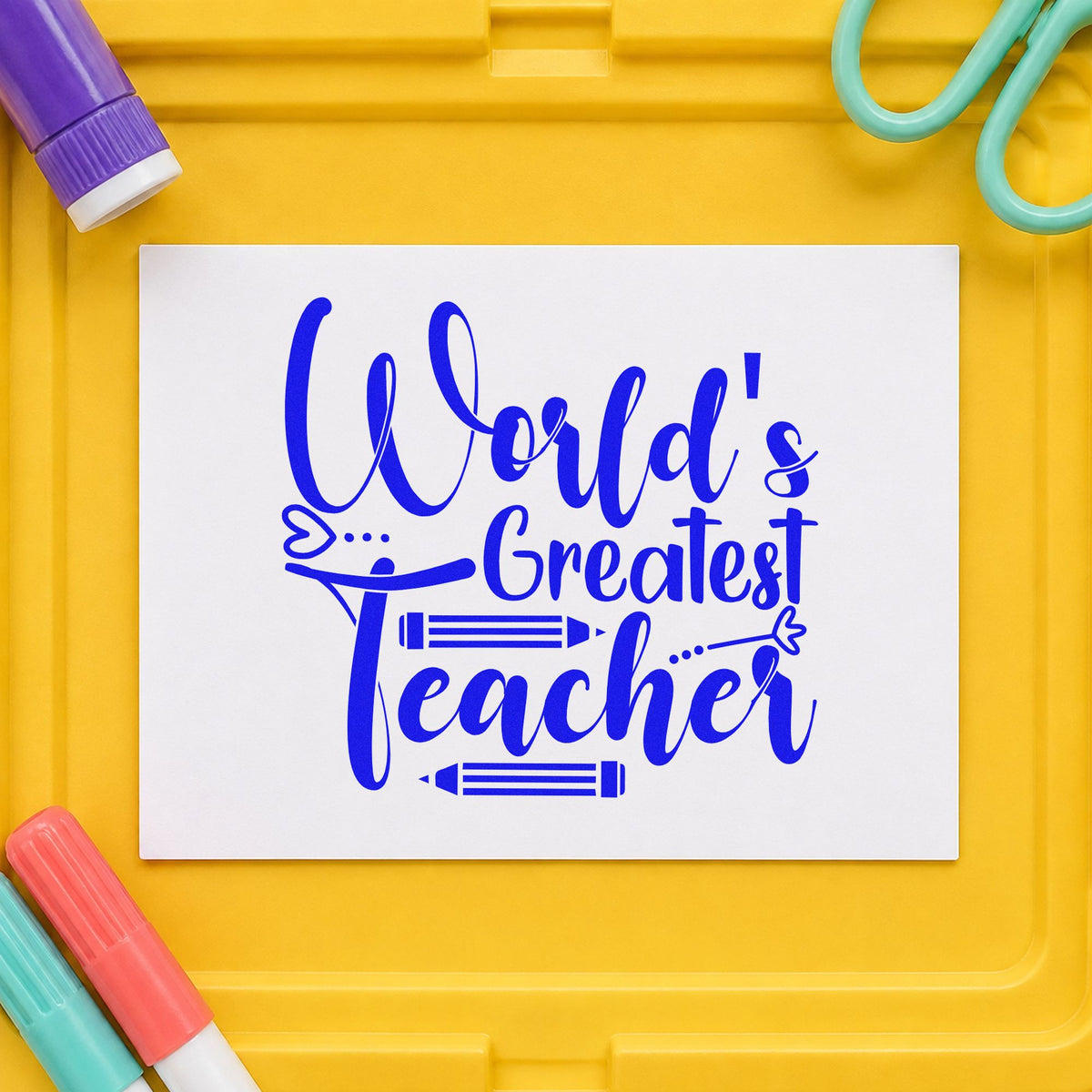 World's Greatest Teacher Pencils craft stamp in blue ink on cardstock, an easy option for podium drape panels.