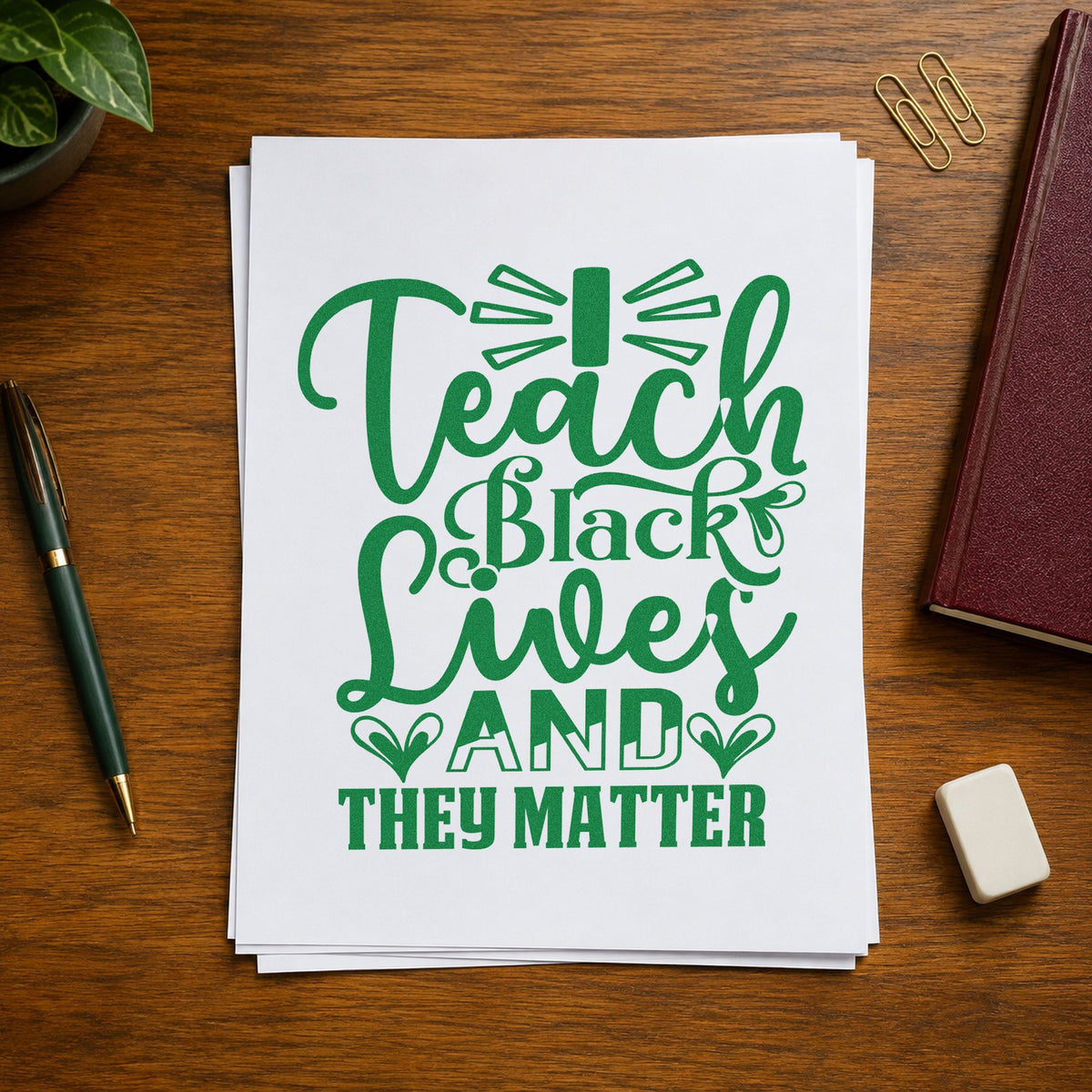 Teach Black Lives Matter craft stamp imprint in green ink on a handmade project, one idea being reading list pages.