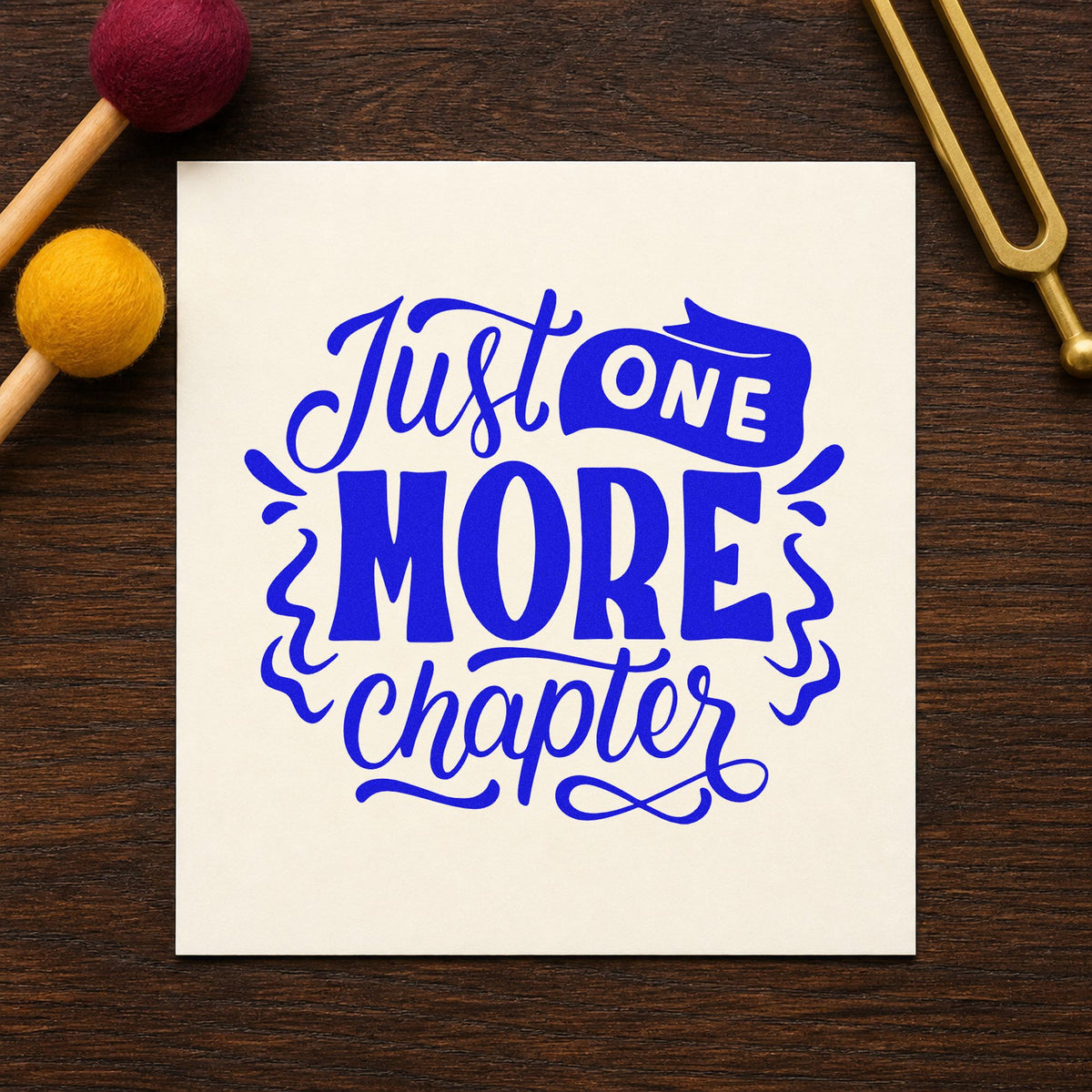 Just One More Chapter craft stamp in blue ink on cardstock, an easy option for pillowcase panels.