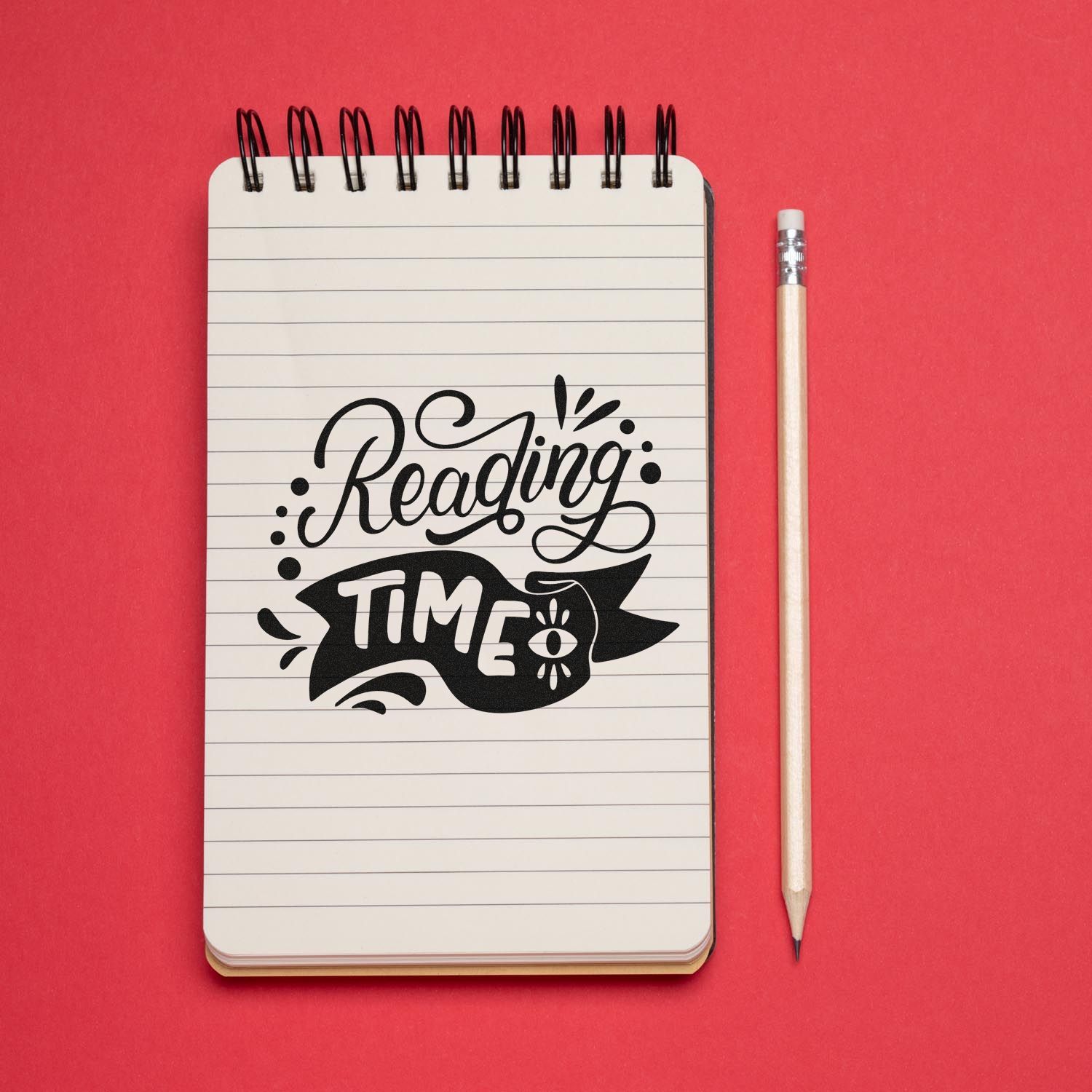 Reading Time rubber stamp design on lined notebook with pencil, ideal for book lovers, teachers, and classroom crafts.
