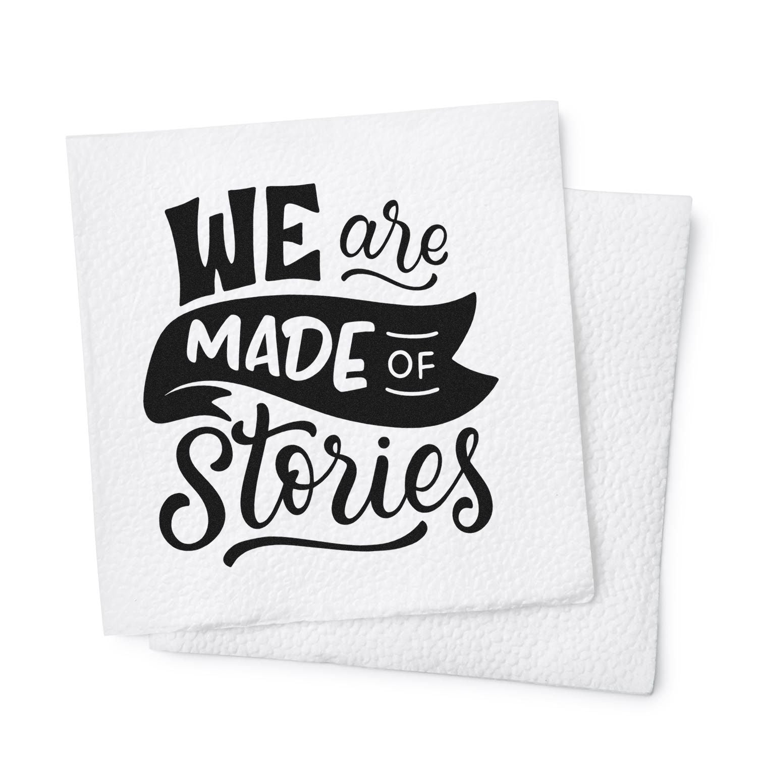 We are made of stories quote rubber stamp design on textured paper, ideal for custom crafting, journaling, and DIY decor.
