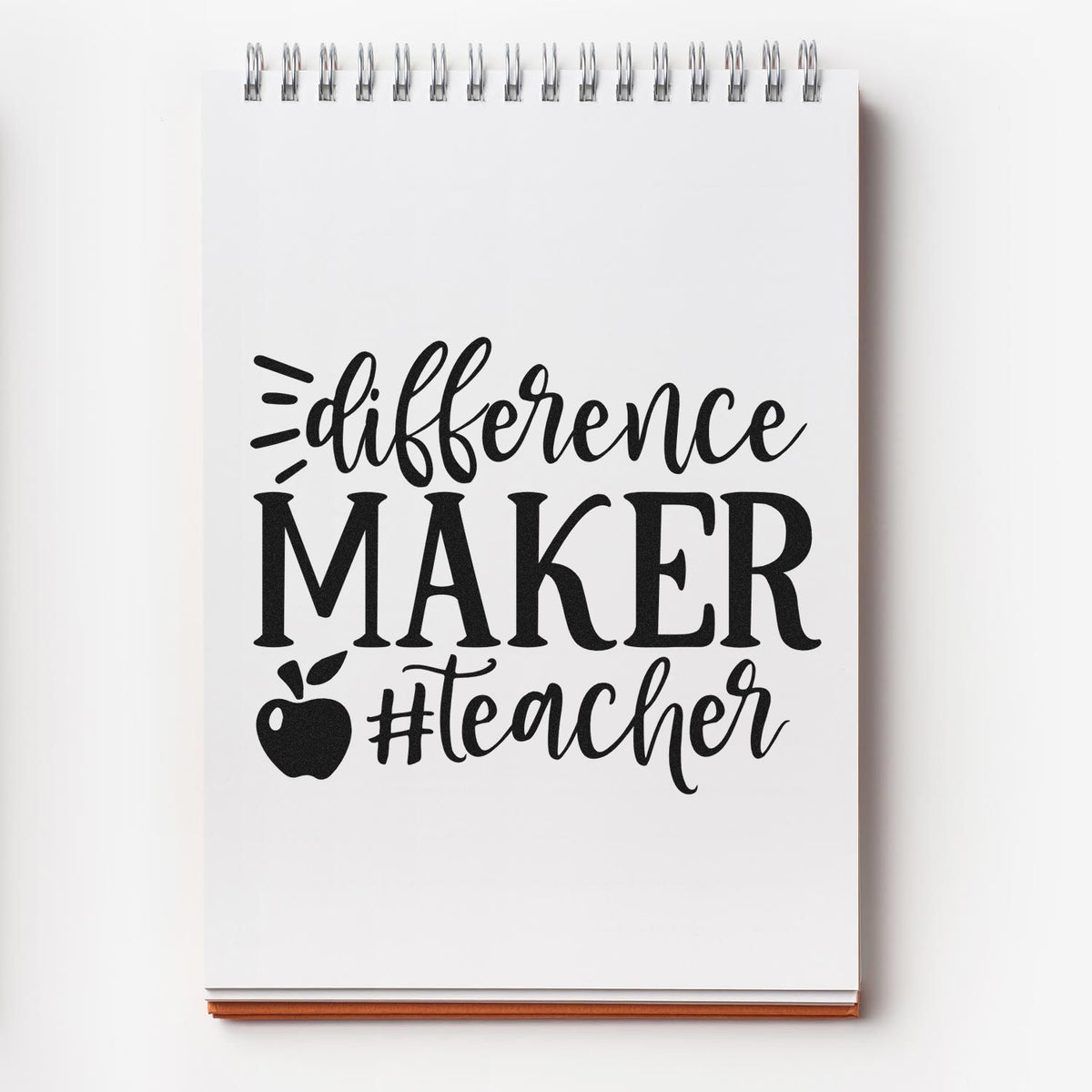 Teacher rubber stamp design reading Difference Maker #Teacher with apple icon for classroom crafts and teacher gifts.