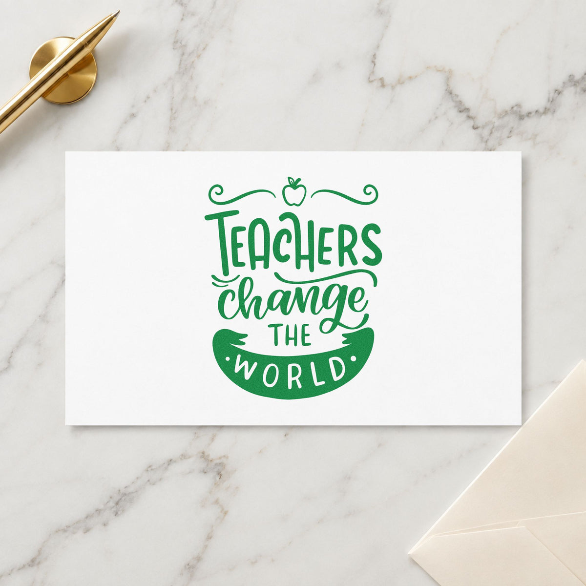 Teachers Change The World Apple craft stamp imprint in green ink on a handmade project, one idea being framed union office.