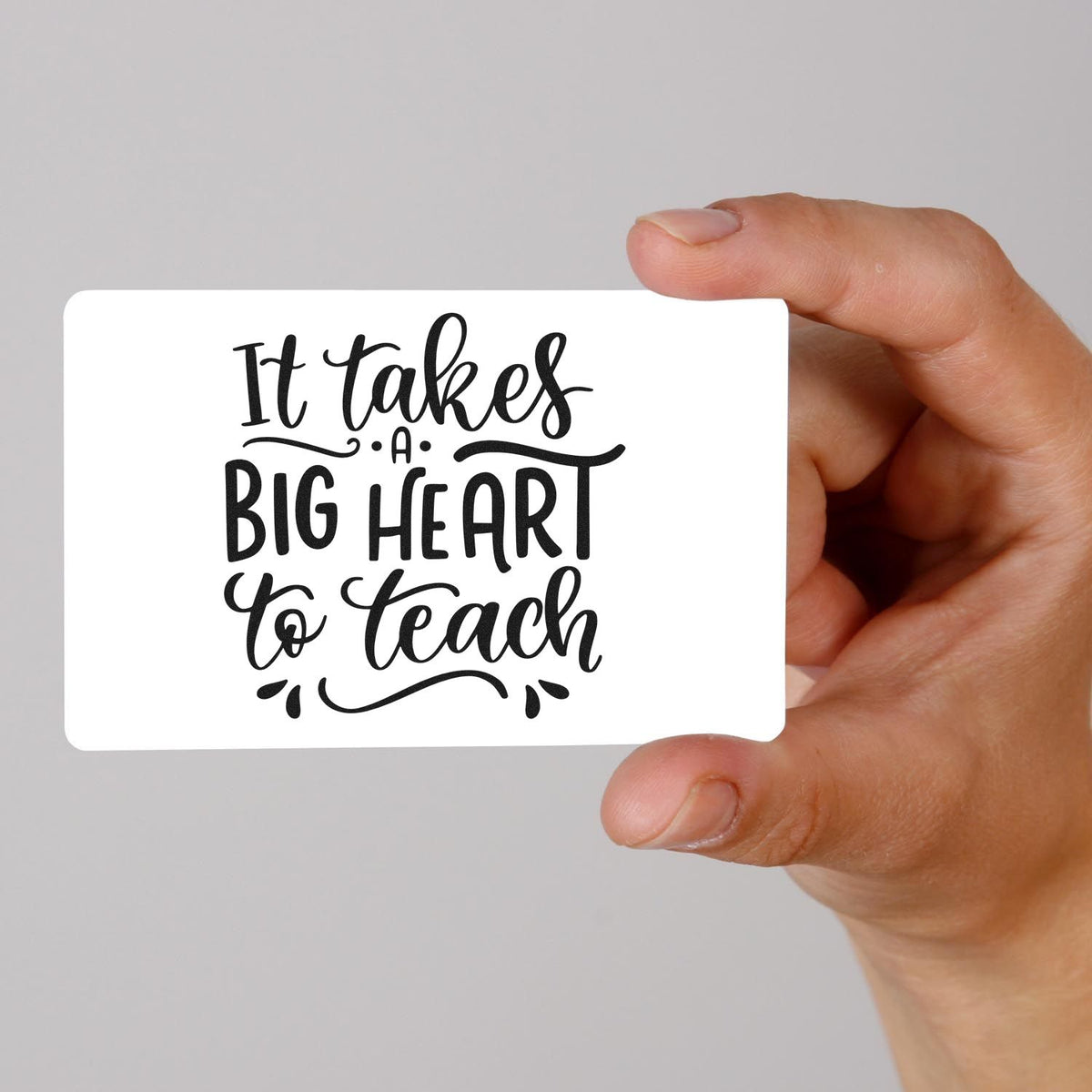 Teacher appreciation rubber stamp design with quote It takes a big heart to teach held in hand.