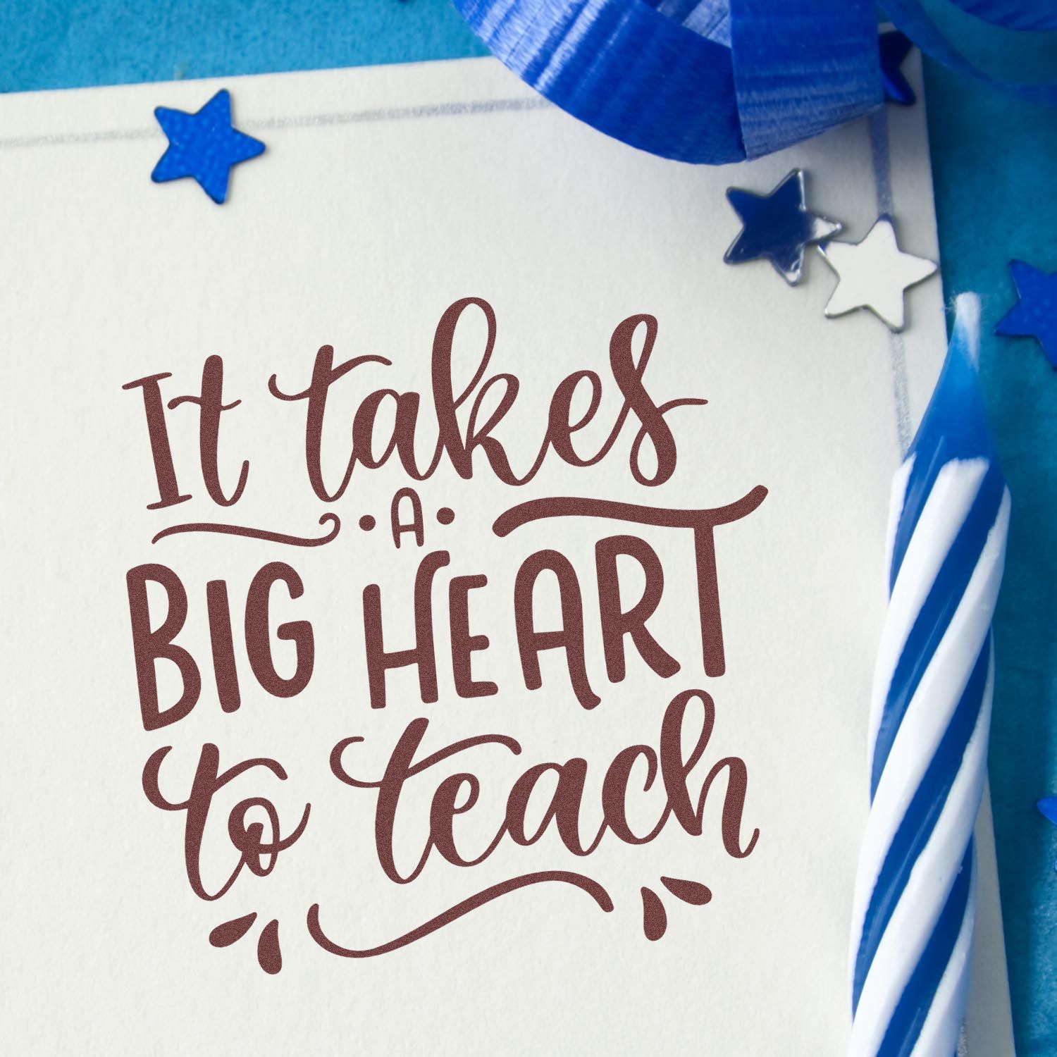 Teacher appreciation rubber stamp design with It takes a big heart to teach in burgundy script and blue star accents.