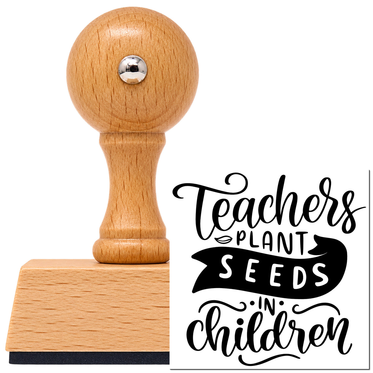 Teachers Plant Seeds In Children Vintage Pro rubber stamp in European beech wood with a round knob handle, shown beside its black imprint.