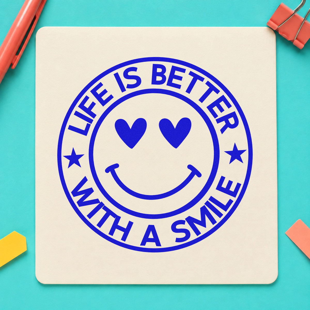 Life Better Smile Round Badge craft stamp imprinted in blue ink on paper, a design suited to photo strip seals.