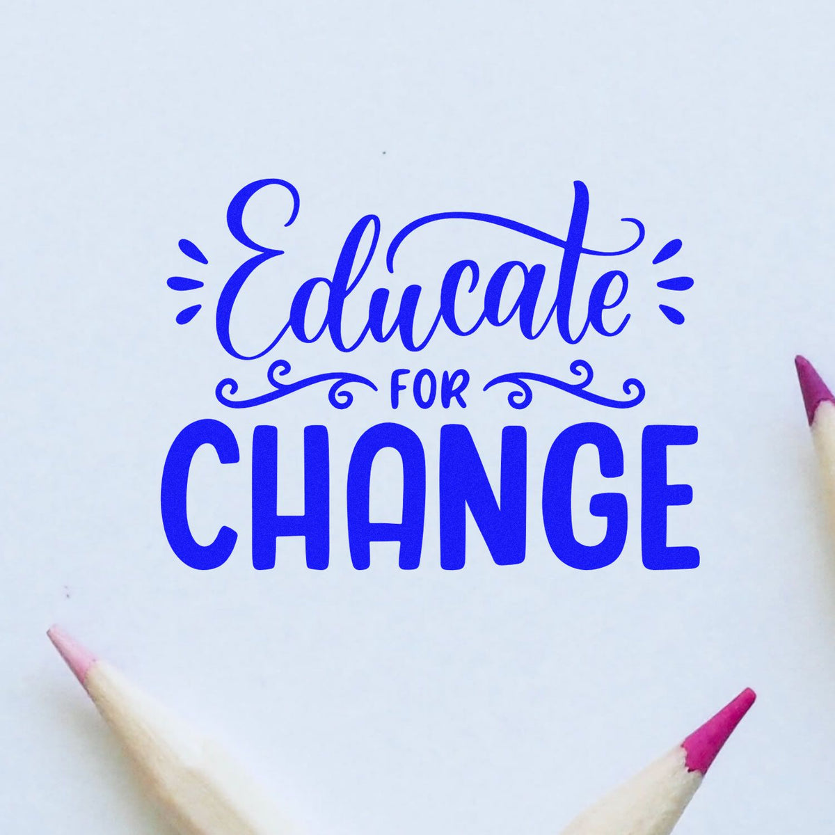 Blue Educate for Change rubber stamp design with pencils, ideal for teacher supplies, classroom crafts, and education projects.
