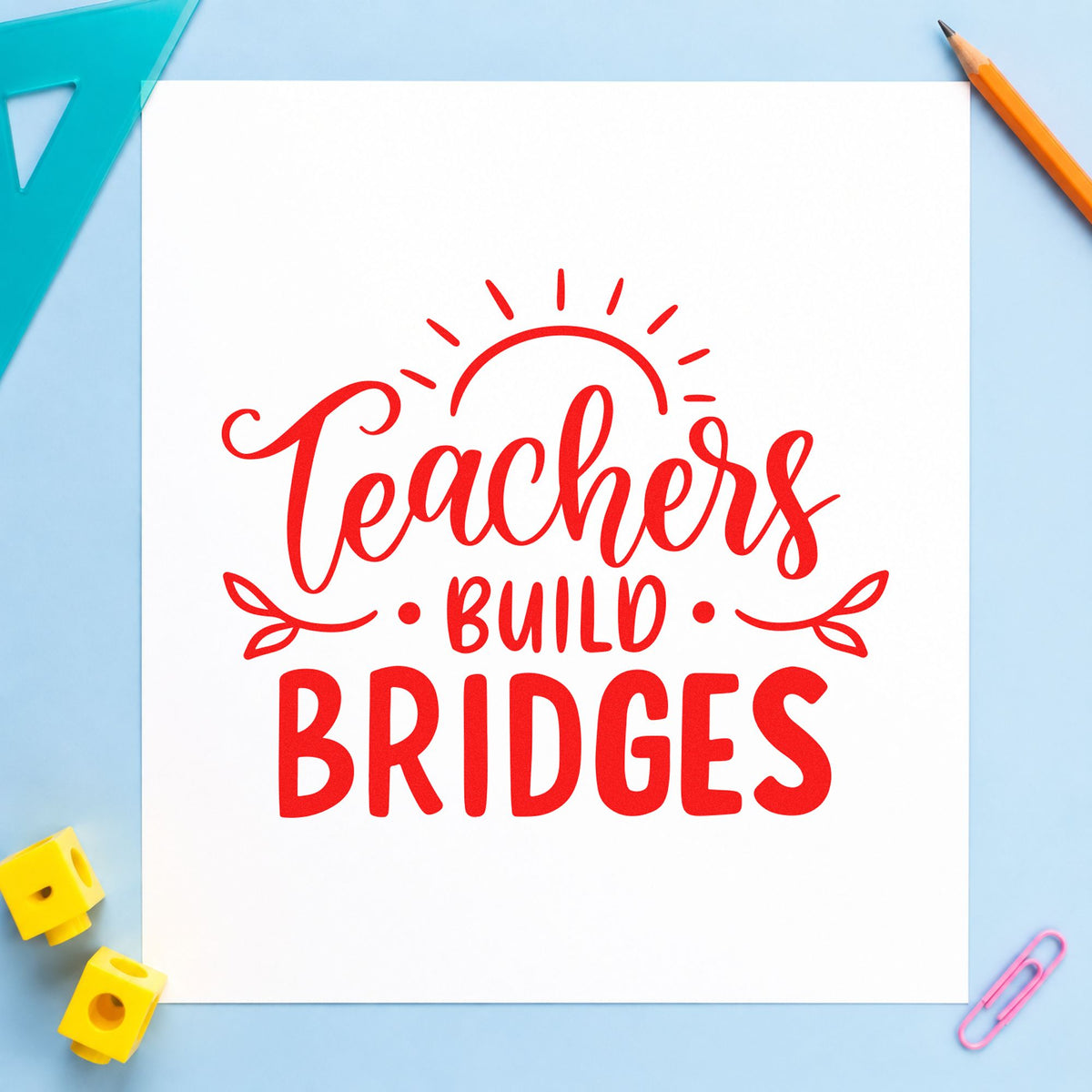 Teachers Build Bridges rubber stamp shown in red ink, stamped for projects such as first visit notes.