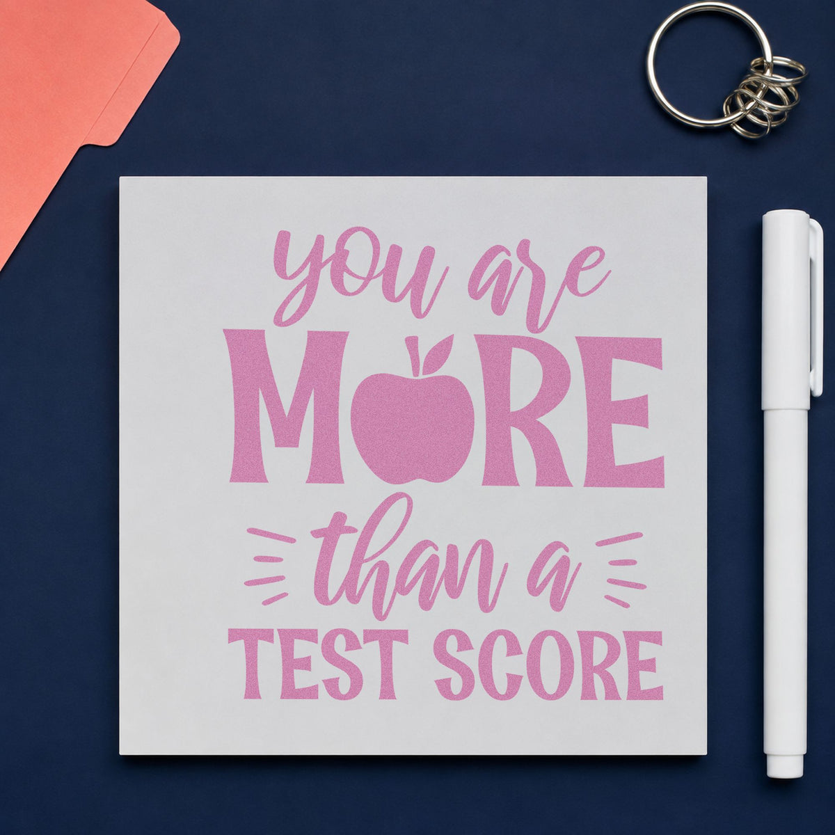 More Than A Test Score craft stamp in purple ink on cardstock, an easy option for support pack tags.