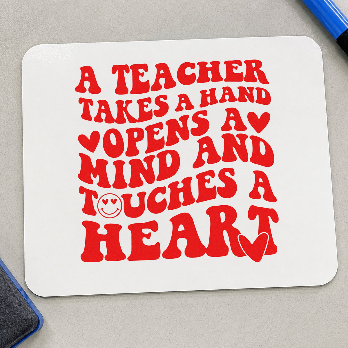 Teacher Takes Hand Touches Heart rubber stamp shown in red ink, stamped for projects such as buddy week notes.