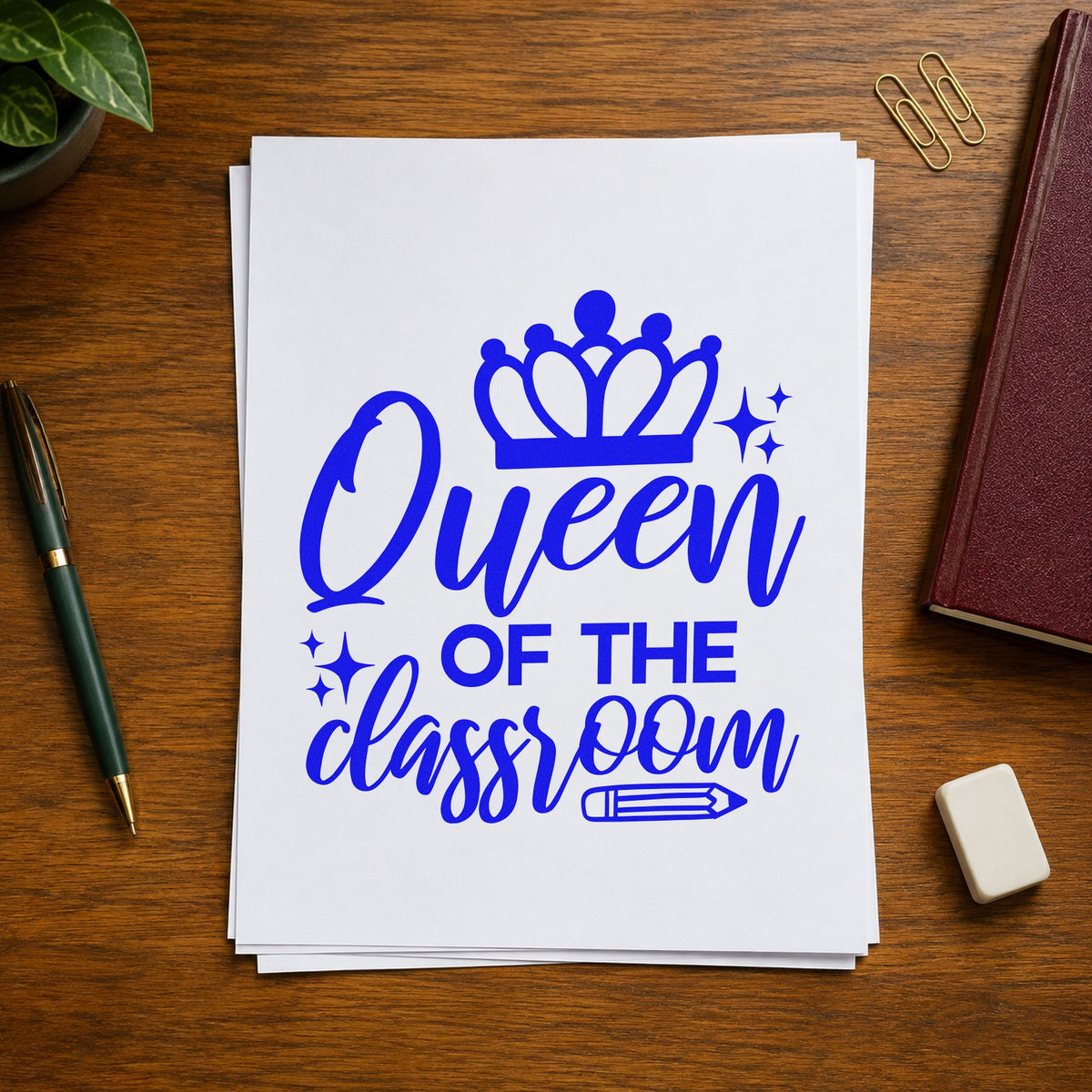Queen Of The Classroom Crown craft stamp imprinted in blue ink on paper, a design suited to royal fold seals.