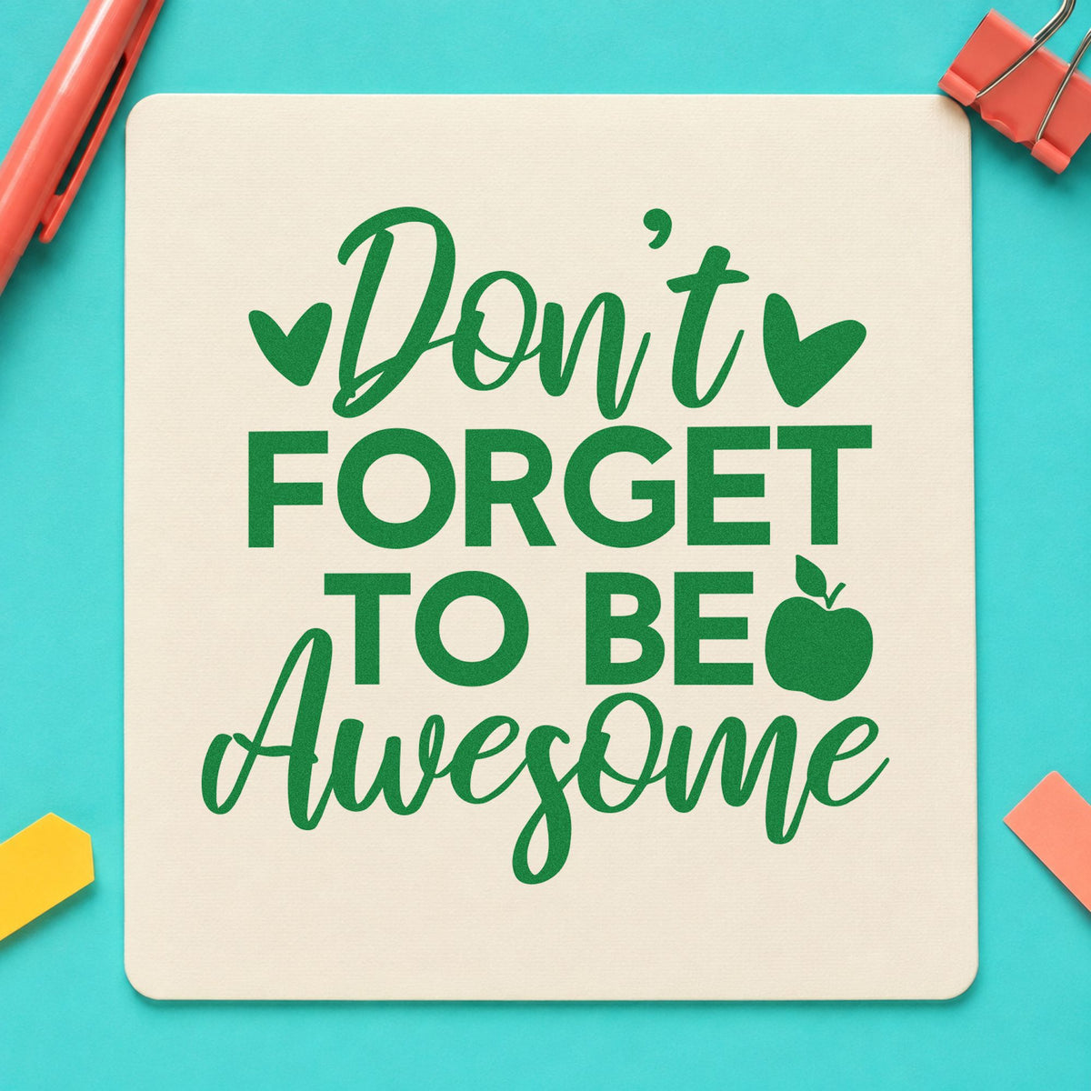 Don't Forget To Be Awesome craft stamp imprint in green ink on a handmade project, one idea being affirmation pages.