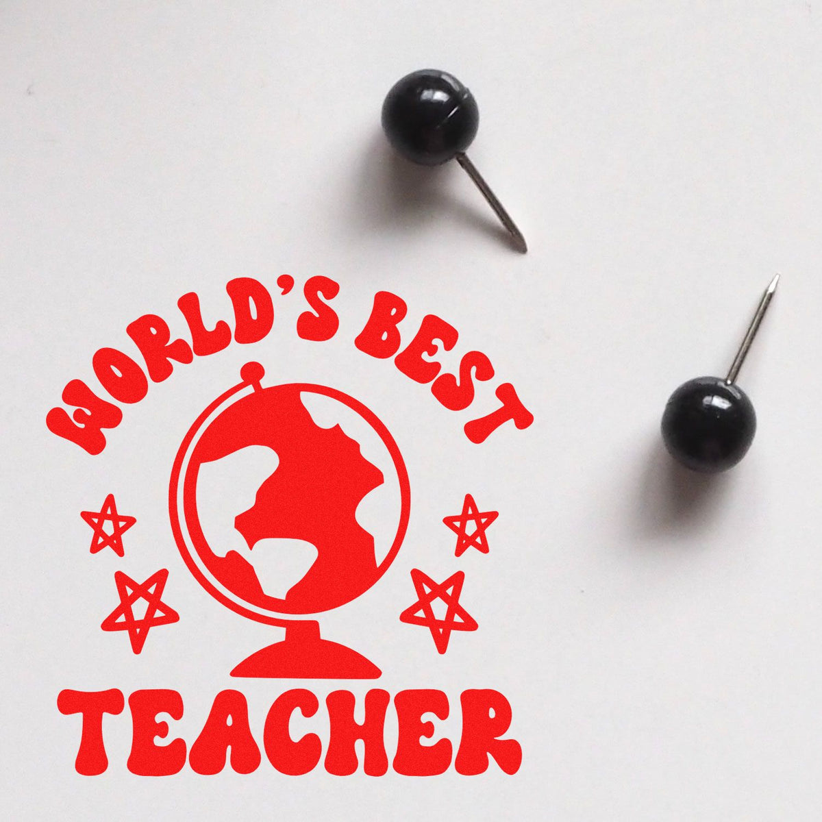 Worlds Best Teacher custom rubber stamp design with globe icon and stars in red on white paper.