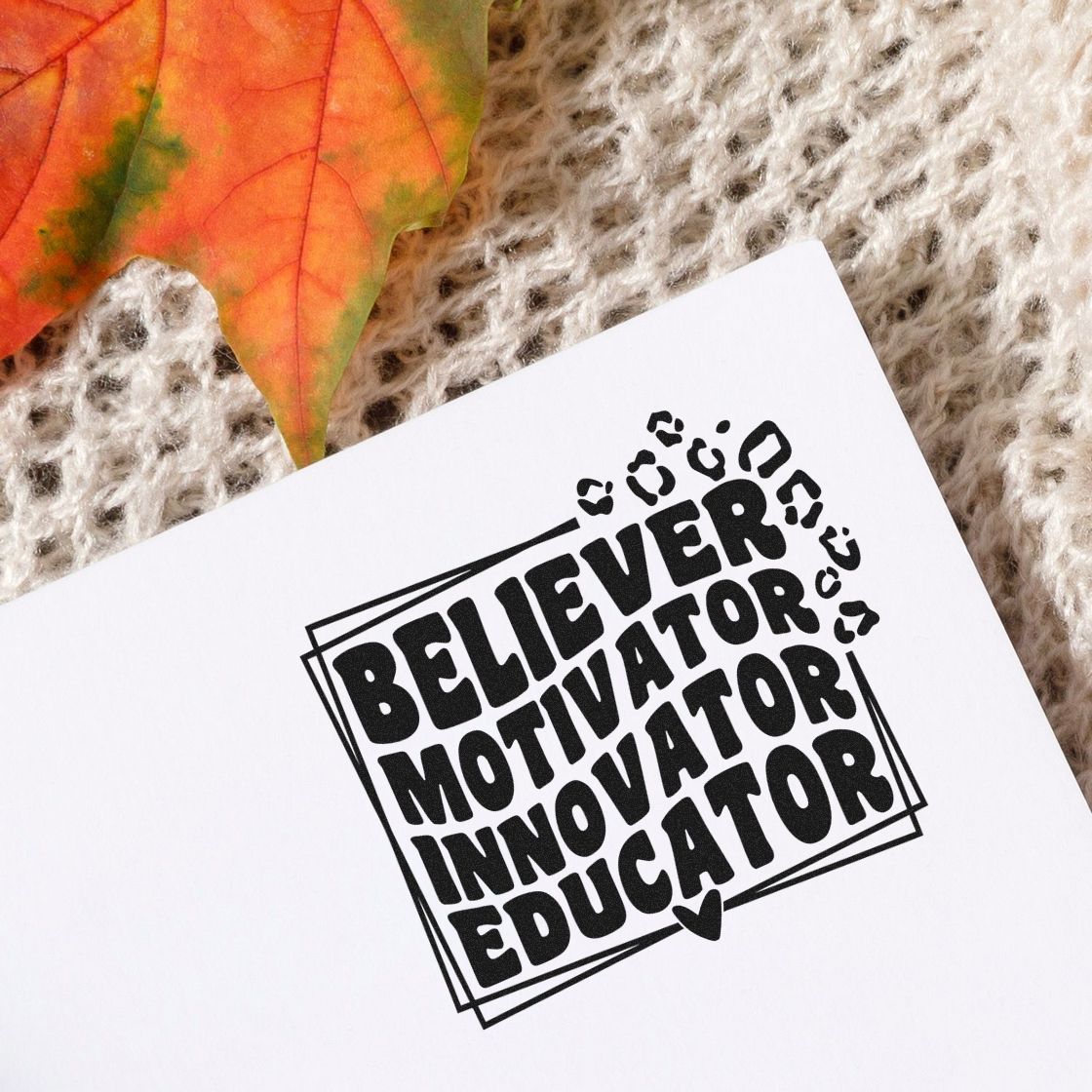 Custom rubber stamp design reading Believer Motivator Innovator Educator for teacher gifts, classroom branding, and stationery.