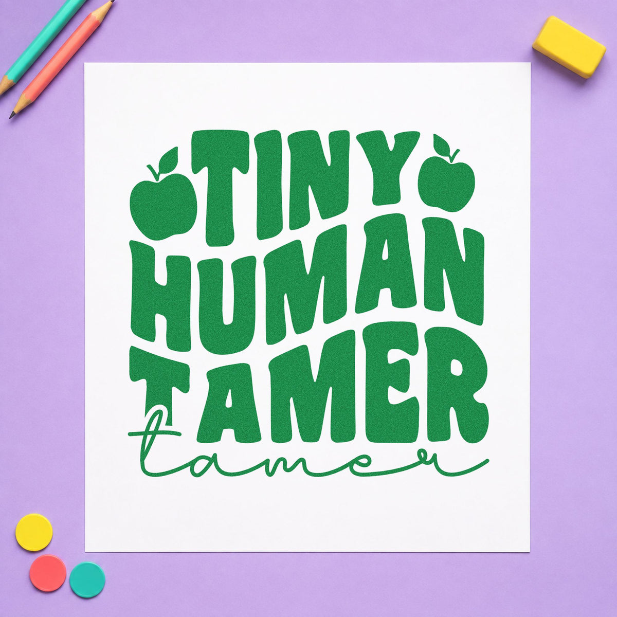 Tiny Human Tamer Apples craft stamp imprint in green ink on a handmade project, one idea being booking form pages.