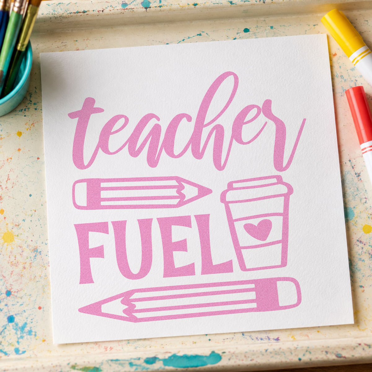 Teacher Fuel Coffee Pencils craft stamp in purple ink on cardstock, an easy option for secret santa tags.