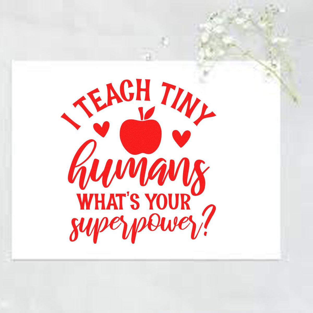 Teacher rubber stamp design with apple and hearts reading I teach tiny humans, whats your superpower?