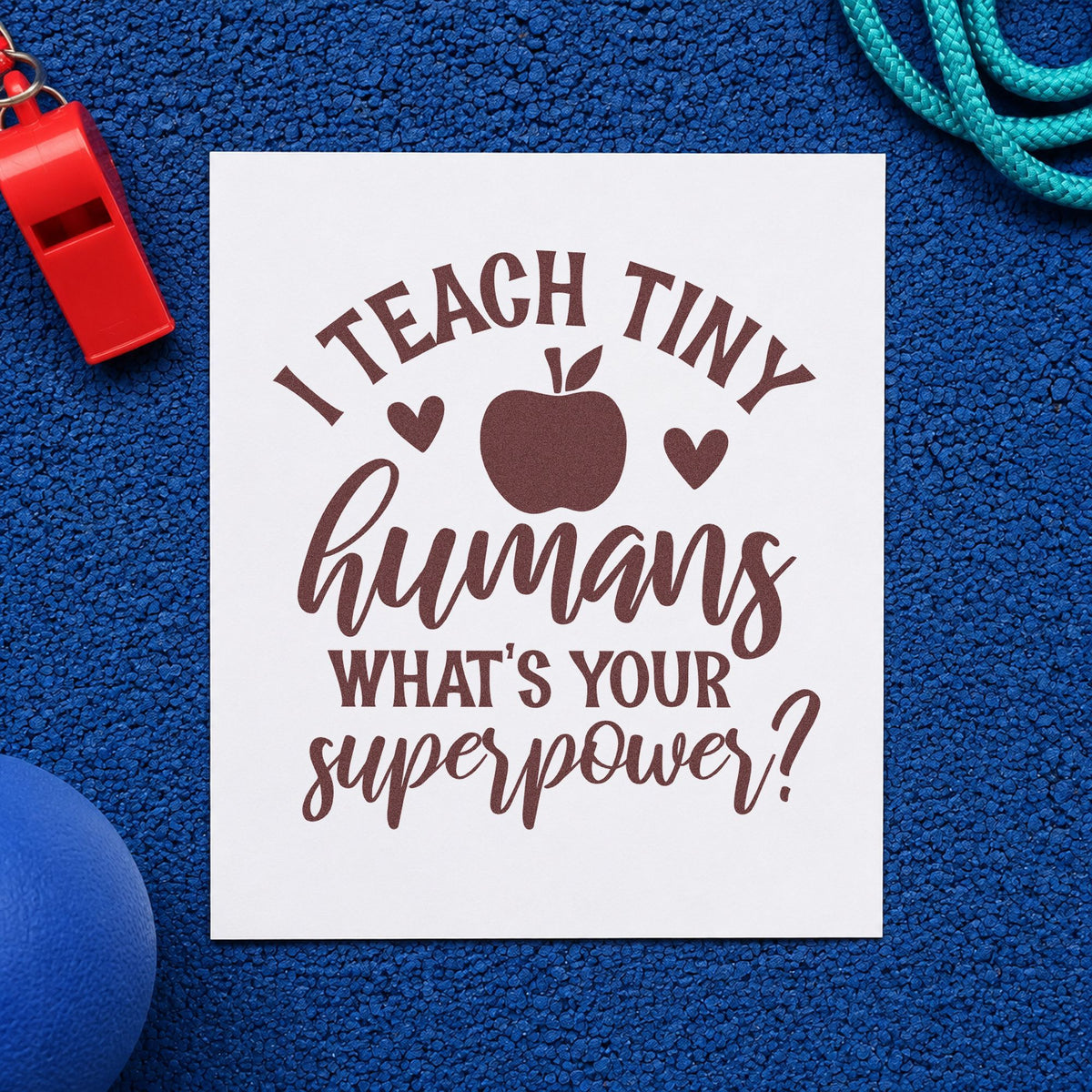 Teach Tiny Humans Superpower rubber stamp printed in brown ink, ready for dress up labels and similar paper crafts.