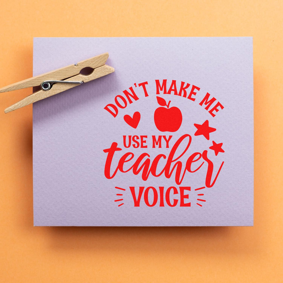 Teacher voice rubber stamp design with apple and stars, ideal for classroom motivation, teacher gifts, and school crafts.