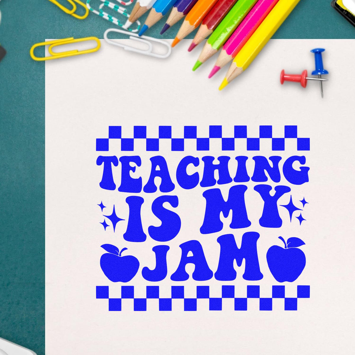 "Teaching Is My Jam" teacher rubber stamp design for classroom crafts, featuring bold blue retro text with school supply accents.