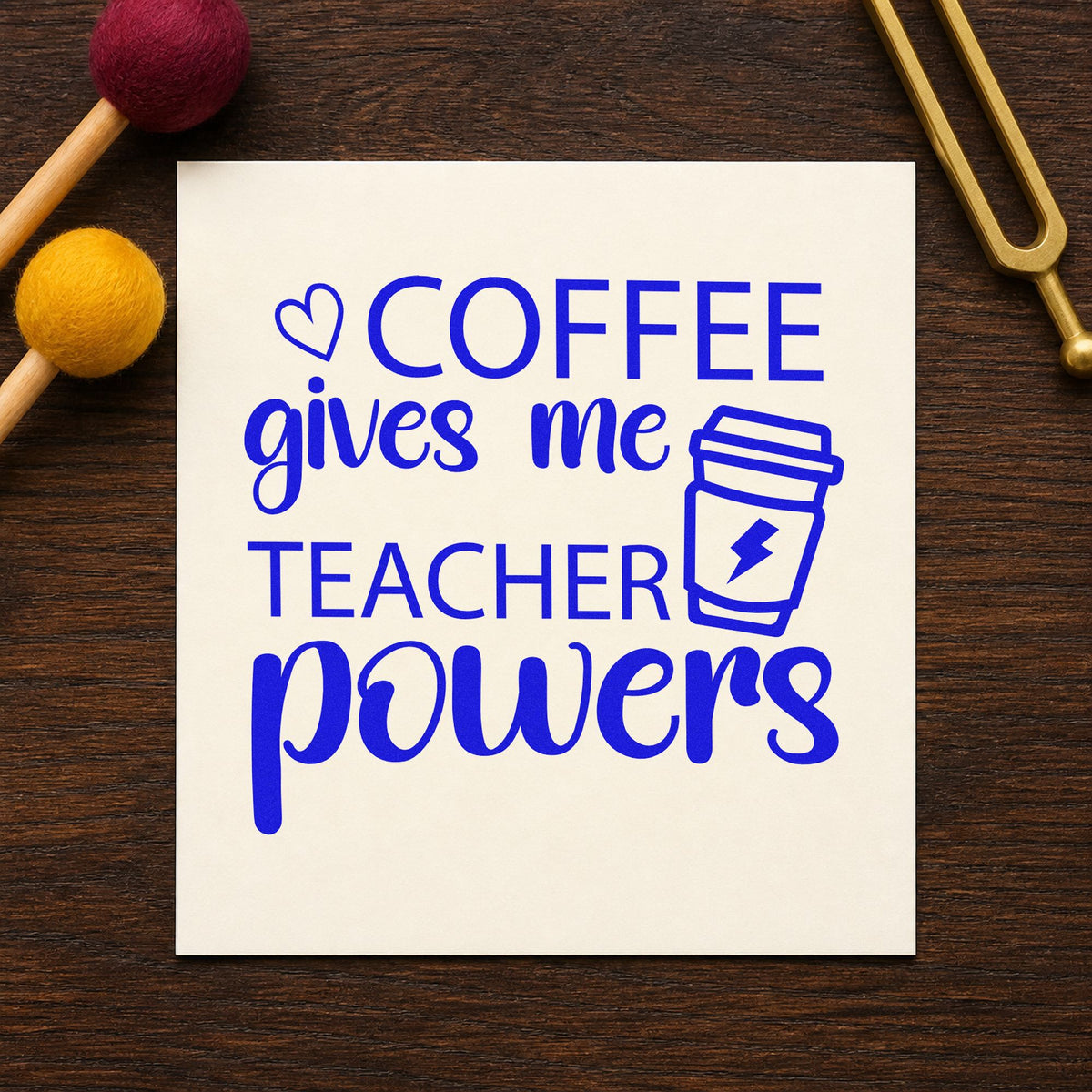 Coffee Gives Me Teacher Powers craft stamp imprinted in blue ink on paper, a design suited to charger bag seals.