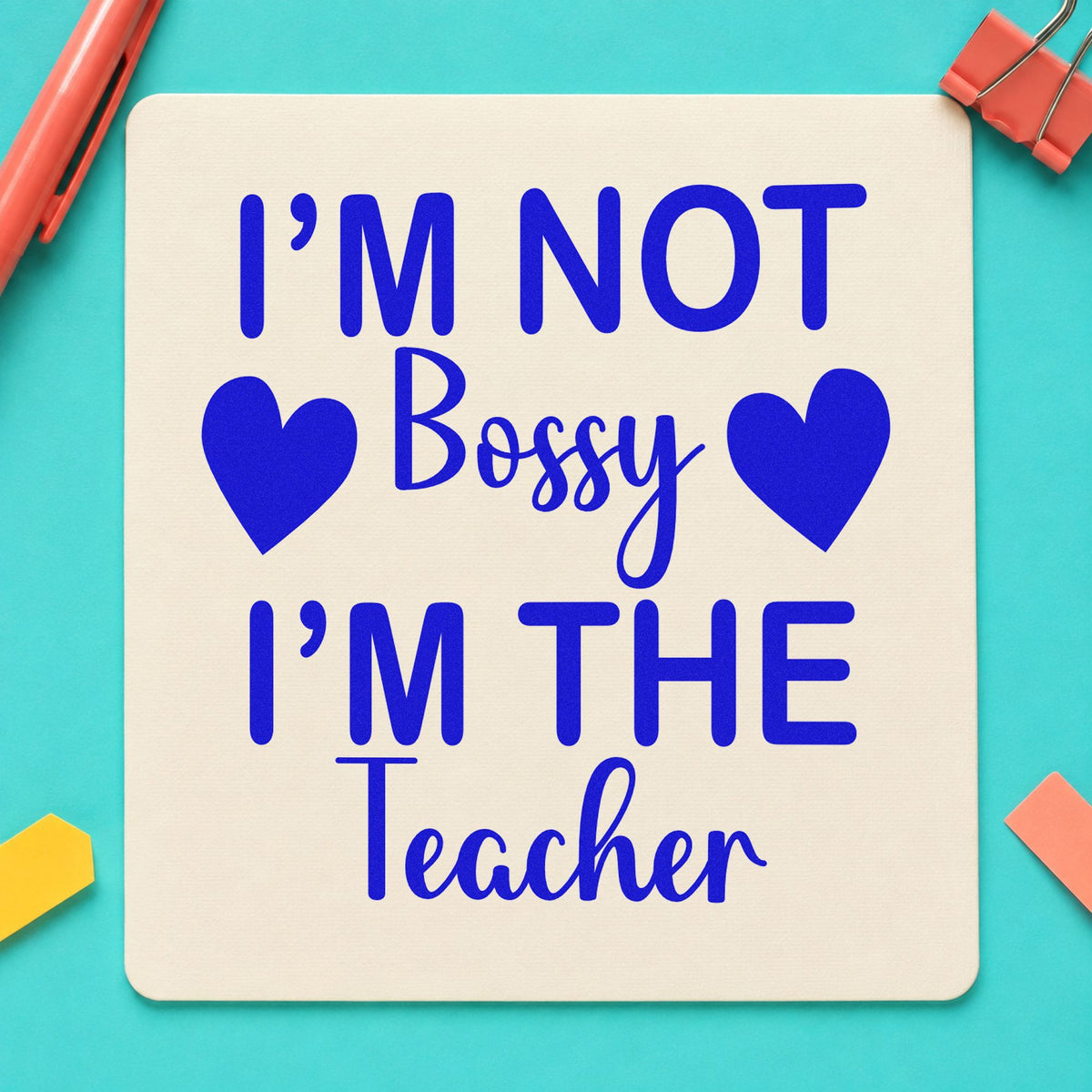 Not Bossy I'm The Teacher craft stamp imprinted in blue ink on paper, a design suited to memo slip seals.