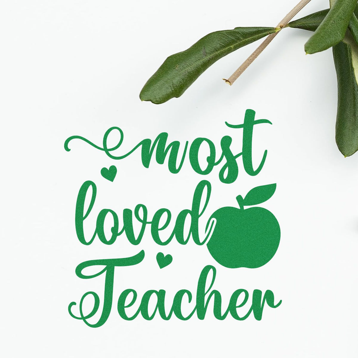 Green Most Loved Teacher rubber stamp design with apple and leaves for teacher appreciation cards, gifts, and classroom crafts.