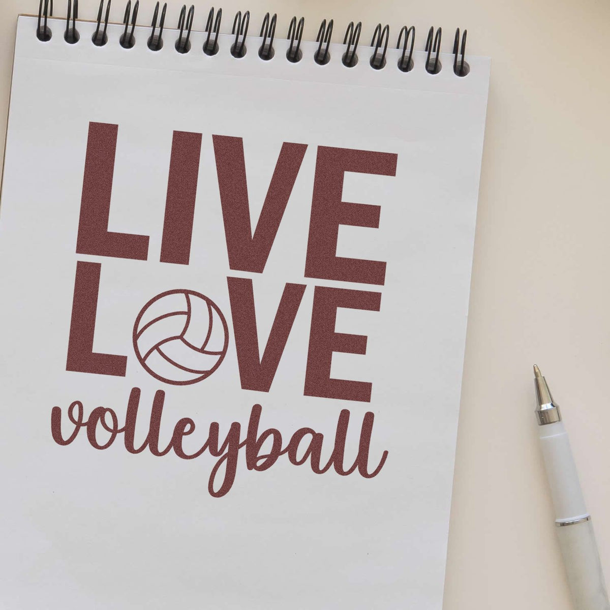 Live Love Volleyball rubber stamp shown in brown ink, stamped for projects such as birthday party tags.
