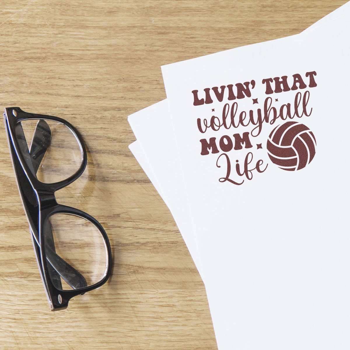 Livin That Volleyball Mom Life rubber stamp shown in brown ink, stamped for projects such as tournament tags.