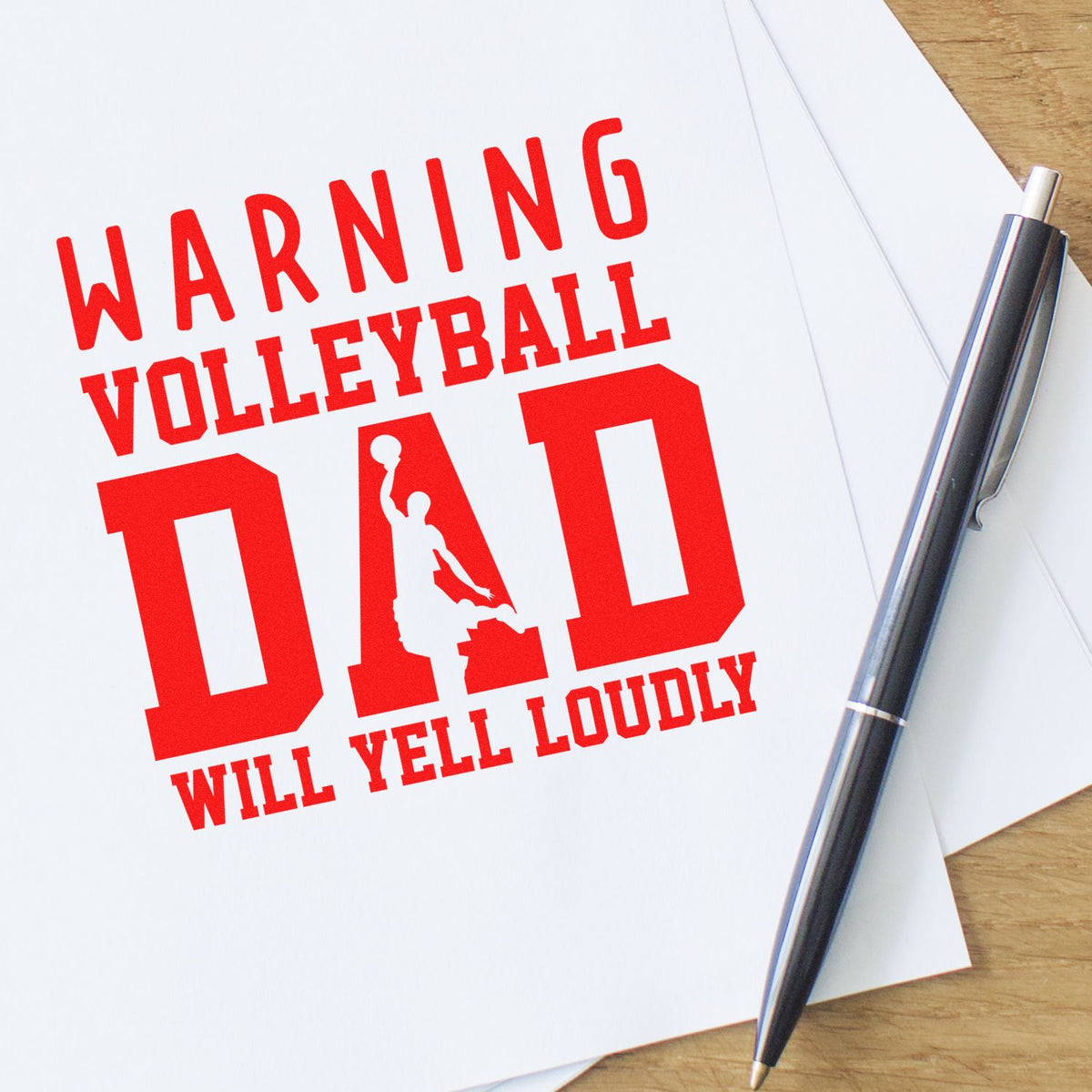 Warning Volleyball Dad Loud rubber stamp shown in red ink, stamped for projects such as tournament tees.