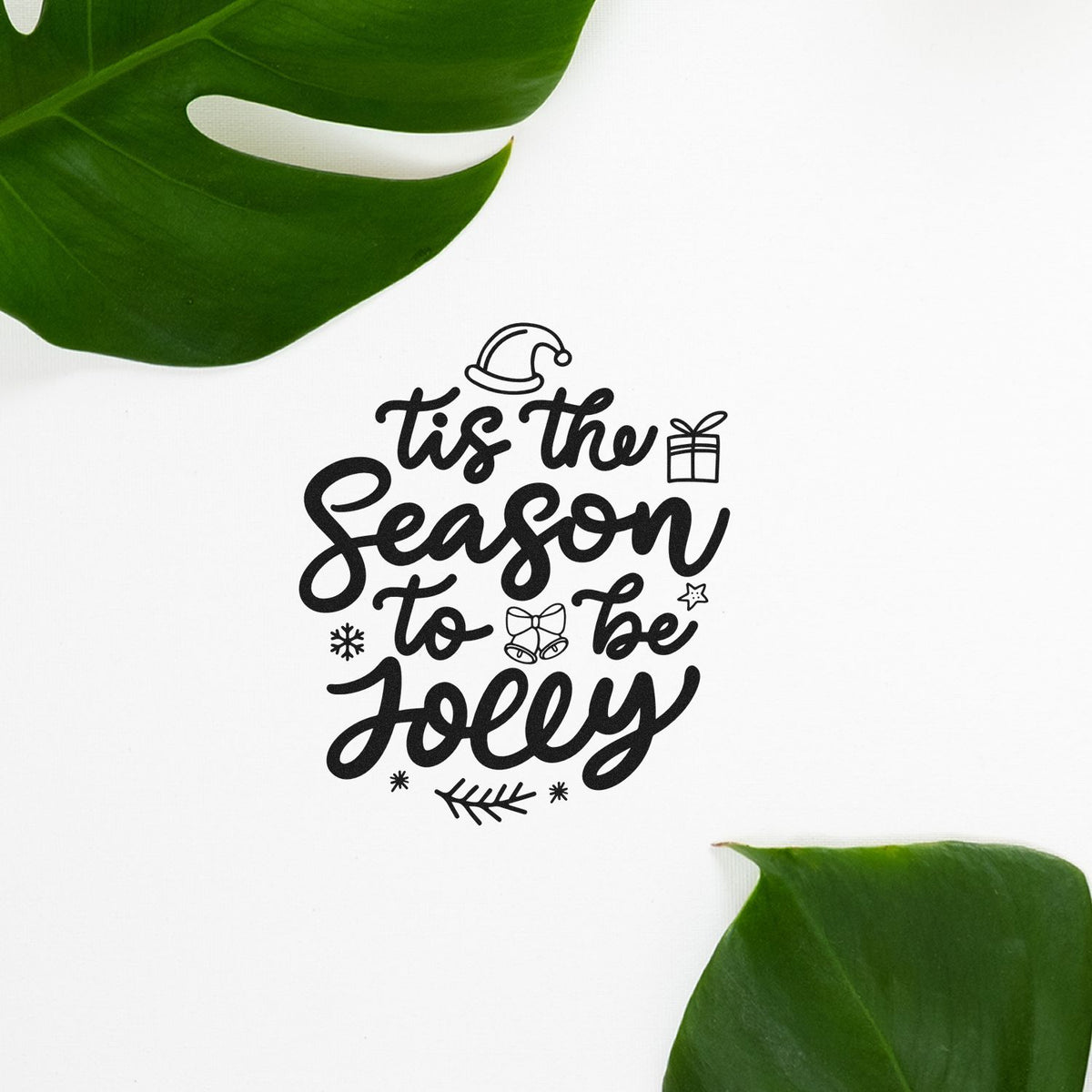 Tis the season to be jolly holiday rubber stamp design with Santa hat, gift, and festive Christmas accents.