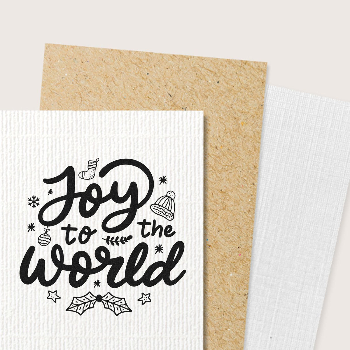 Joy to the World Christmas rubber stamp for handmade holiday cards, with festive icons on textured paper.