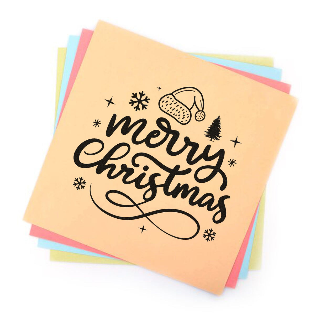 Merry Christmas rubber stamp design on pastel paper stack for holiday card making and festive craft projects.