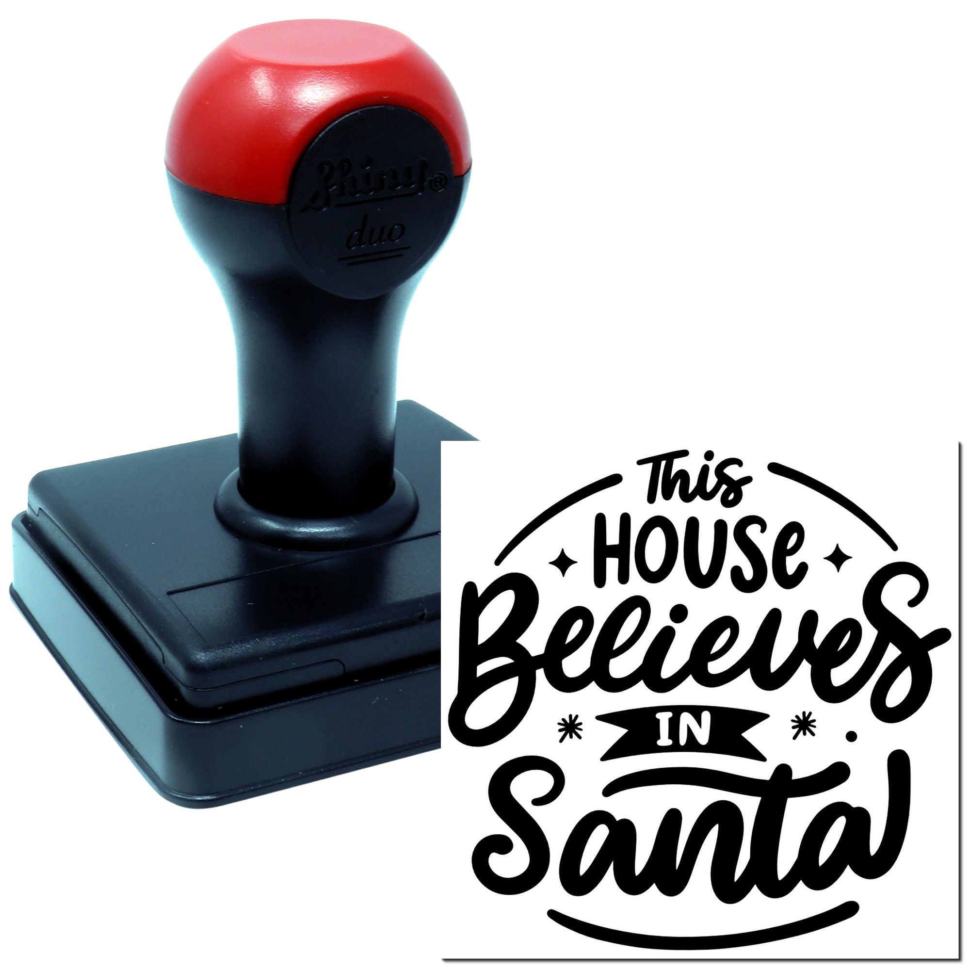 Self-inking rubber stamp with This House Believes in Santa design for holiday cards, crafts, and festive gift tags.