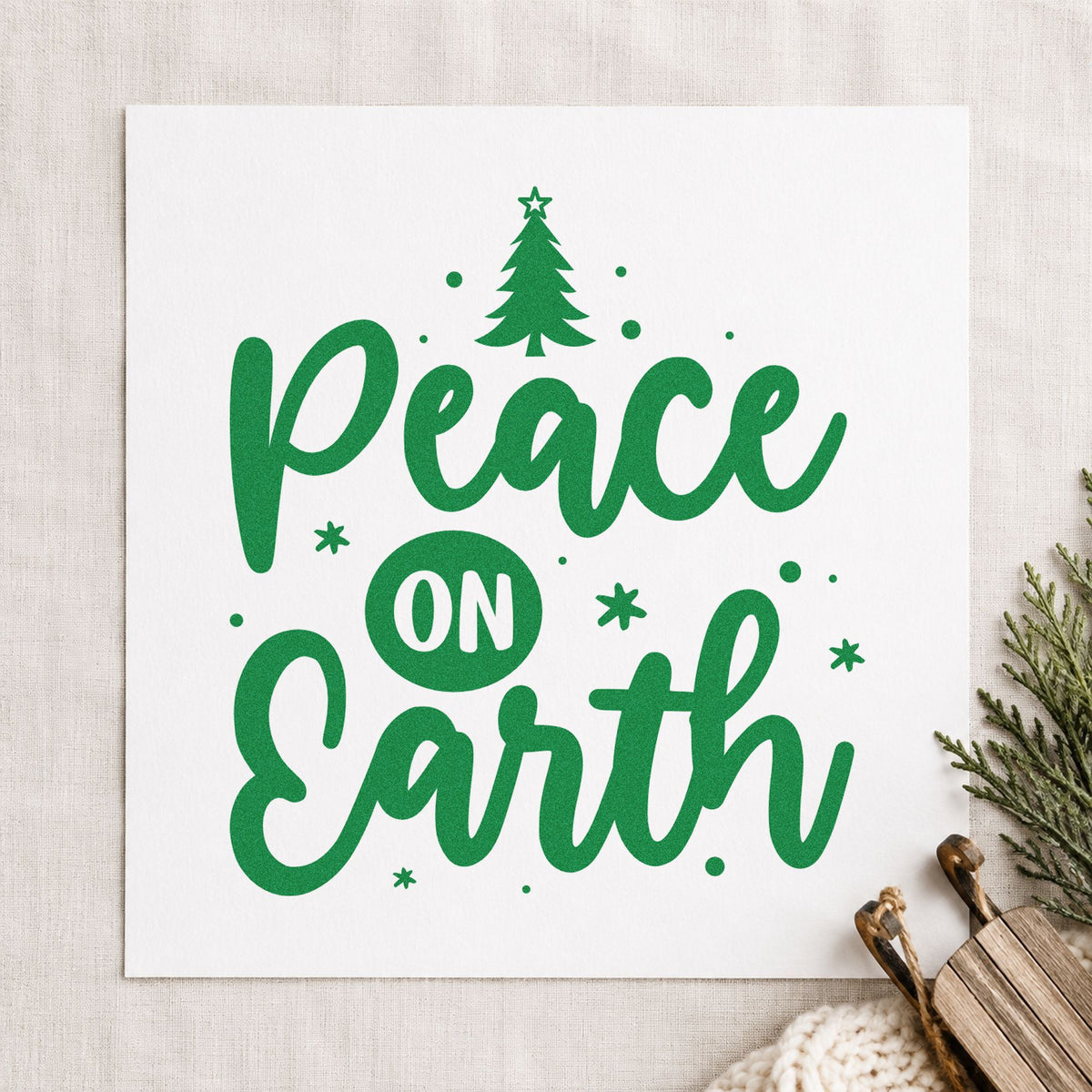 Peace On Earth Tree craft stamp imprint in green ink on a handmade project, one idea being collection pages.