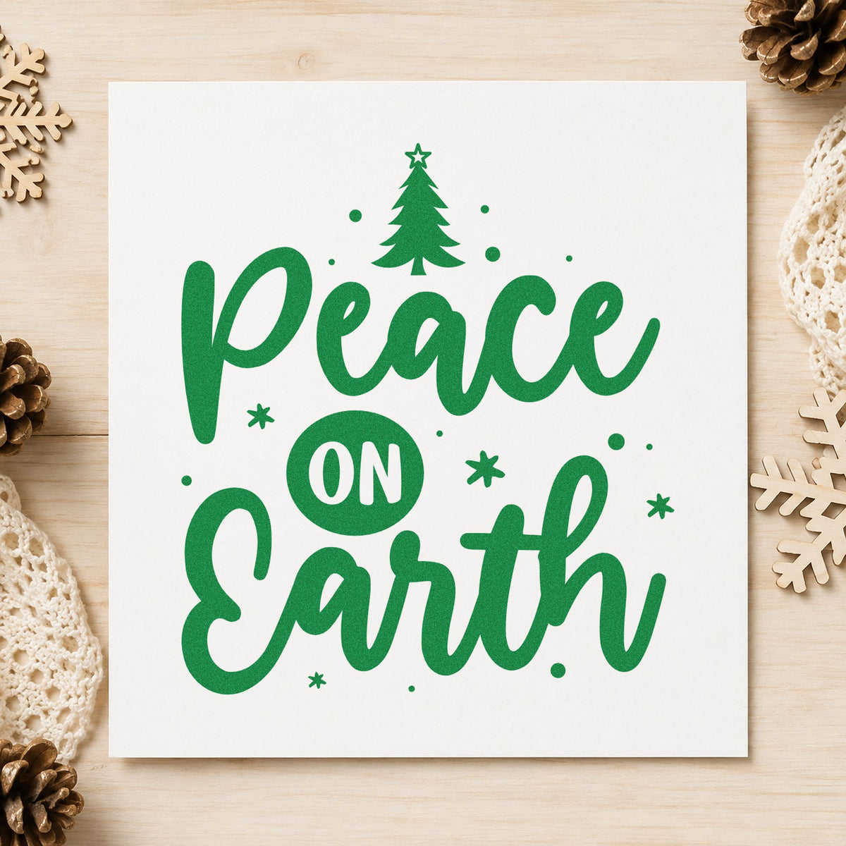 Peace On Earth Tree craft stamp imprinted in green ink on paper, a design suited to appeal fold seals.