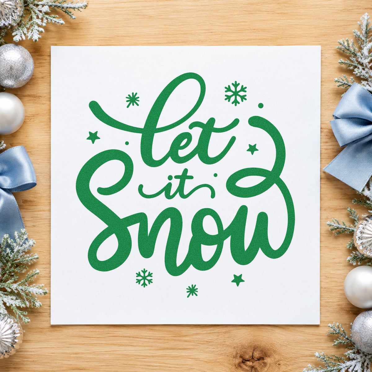 Let It Snow Script craft stamp imprint in green ink on a handmade project, one idea being weather log pages.